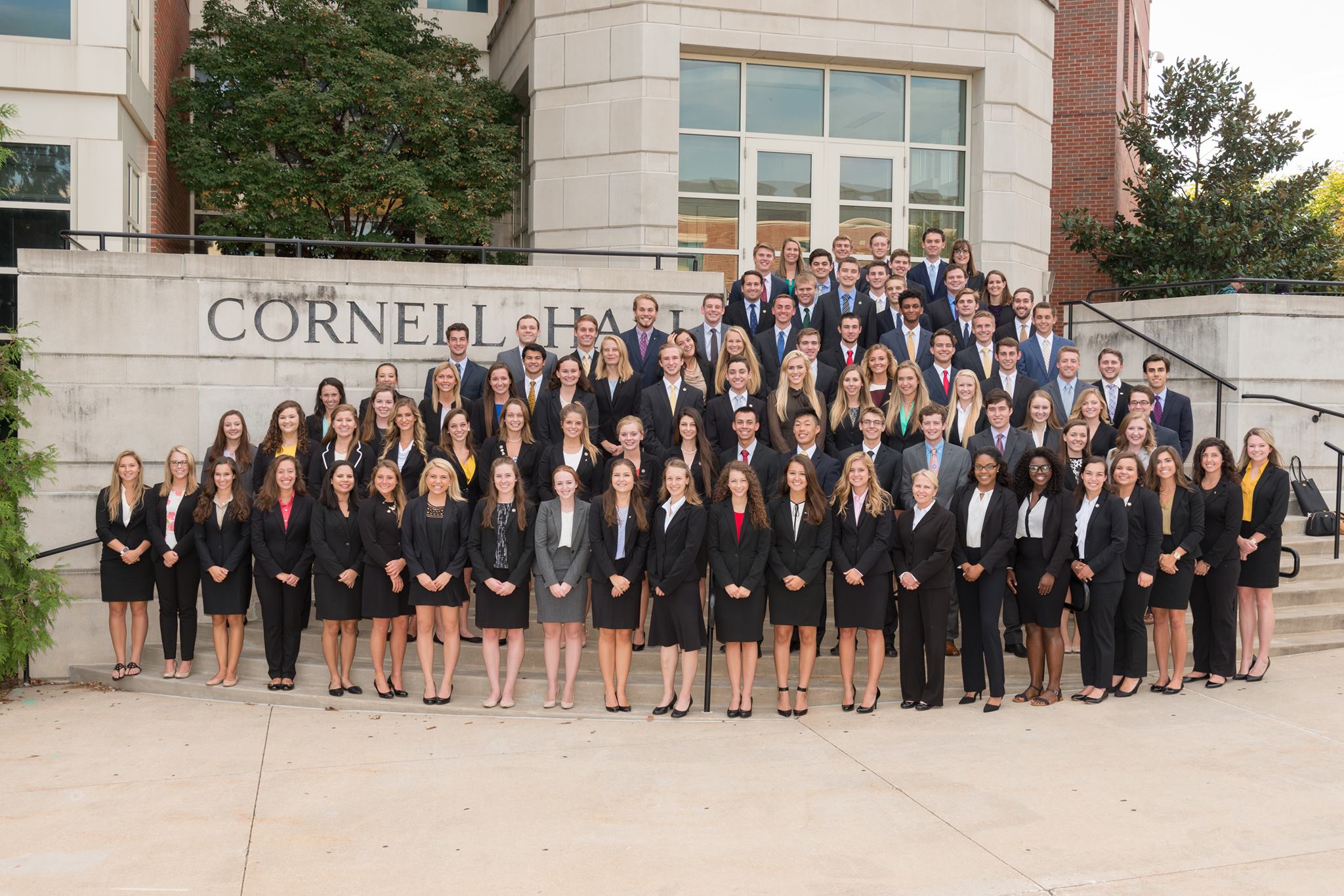 Business Students pose in Business casual