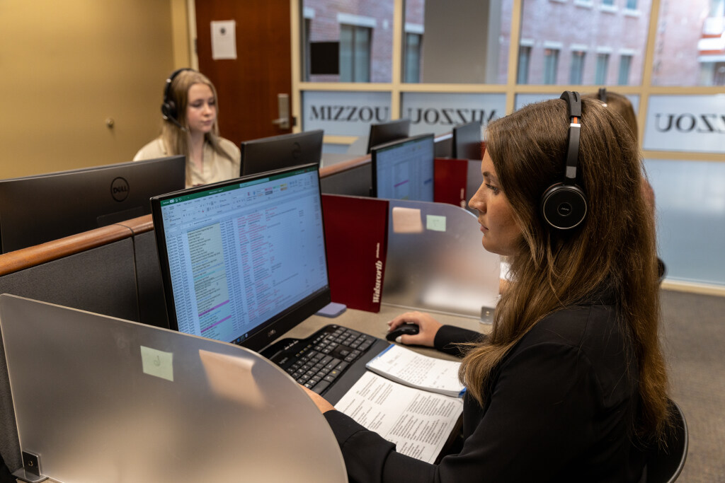 Students gather in computer lab to study and do homework