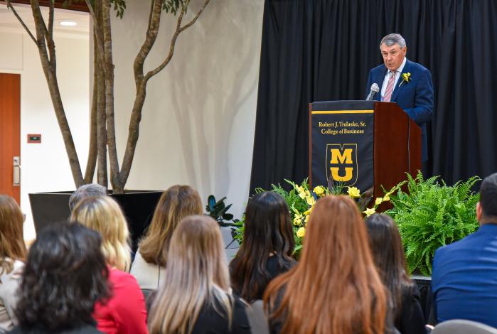 Irl Engelhardt speaking in Cornell Hall