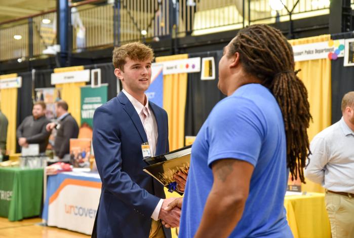 Image: Student shaking employer hand