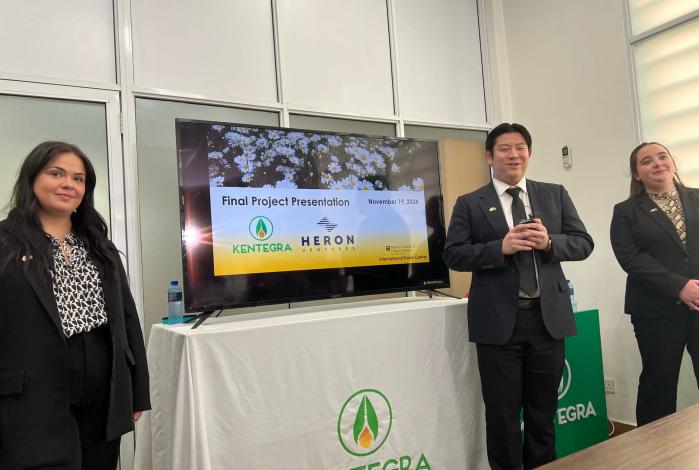 image: students presenting in Kenya