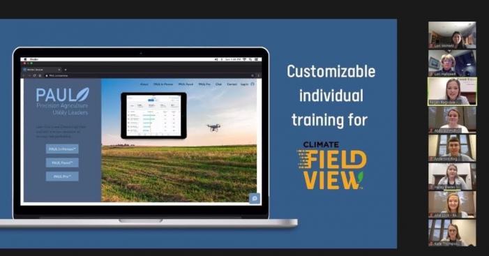 Laptop with PAUL web page displayed on it, 